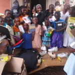 The students are happy to receive supplies and clothes that were shipped by Age of Awareness